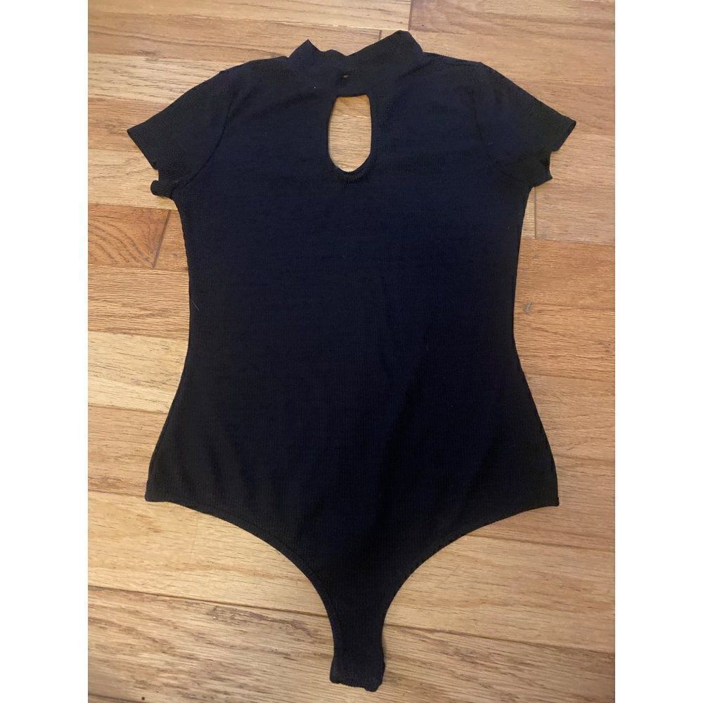 Me to We women's black high neck peek a boo short sleeve bodysuit size medium